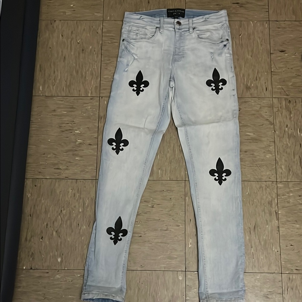 Designer Light Wash Jeans with Black Emblem